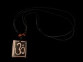 CD38 Collier Tibétain Om