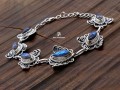 BRA84. Bracelet Tibétain Argent Massif Papillon Labradorite